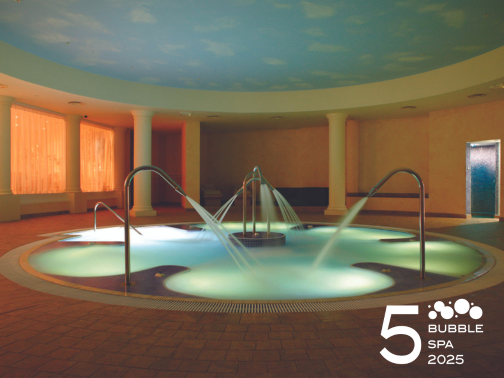 The Day Spa's Hydrotherapy Pool with Good Spa Guide's 5 Bubble Spa Award logo in bottom right hand corner