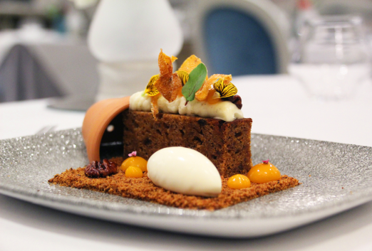 Murrays famous ginger cake served with breadcrumbs, scoop of ice cream and themed to look like it is coming out of a plant pot