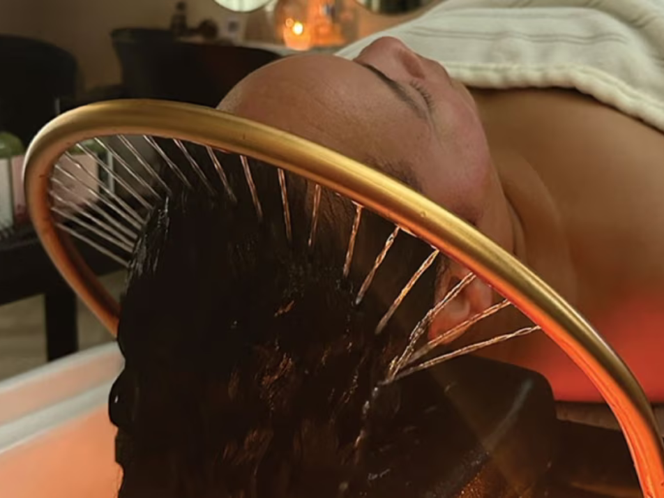 Lady receiving a scalp wash via a Japanese Head Spa Wash Machine