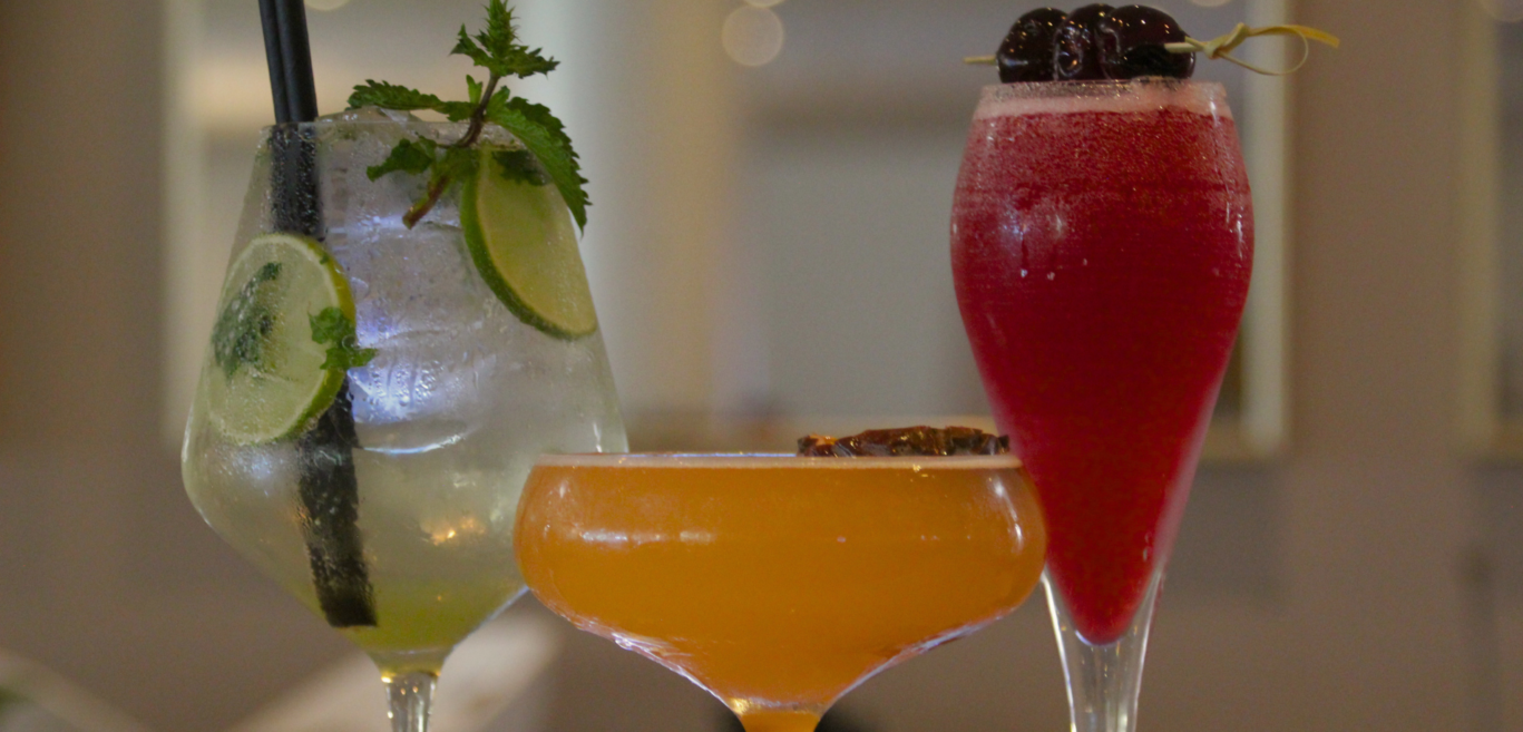 A collection of colour cocktails sitting atop Whittlebury Park's Nova Bar