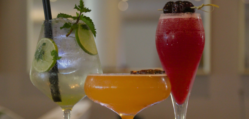 A collection of colour cocktails sitting atop Whittlebury Park's Nova Bar